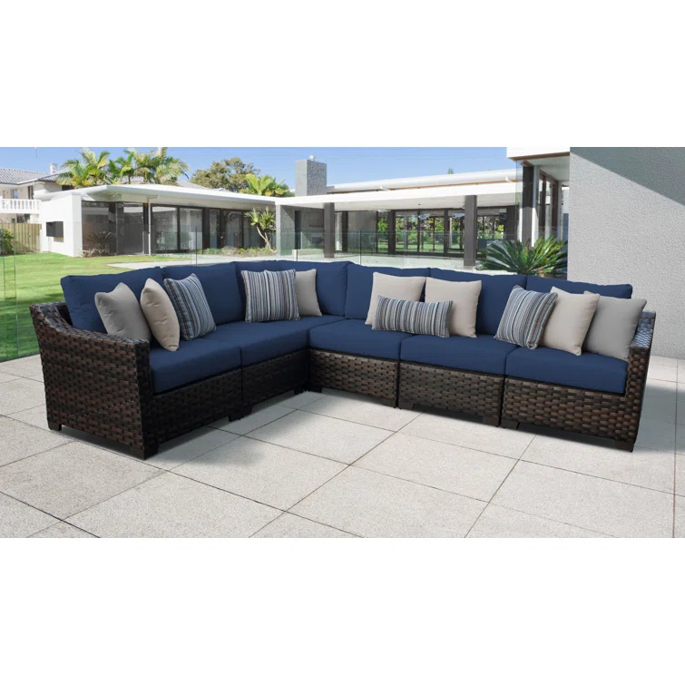 kathy ireland Homes & Gardens by TK Classics 126'' Wide Wicker Patio Sectional with Cushions