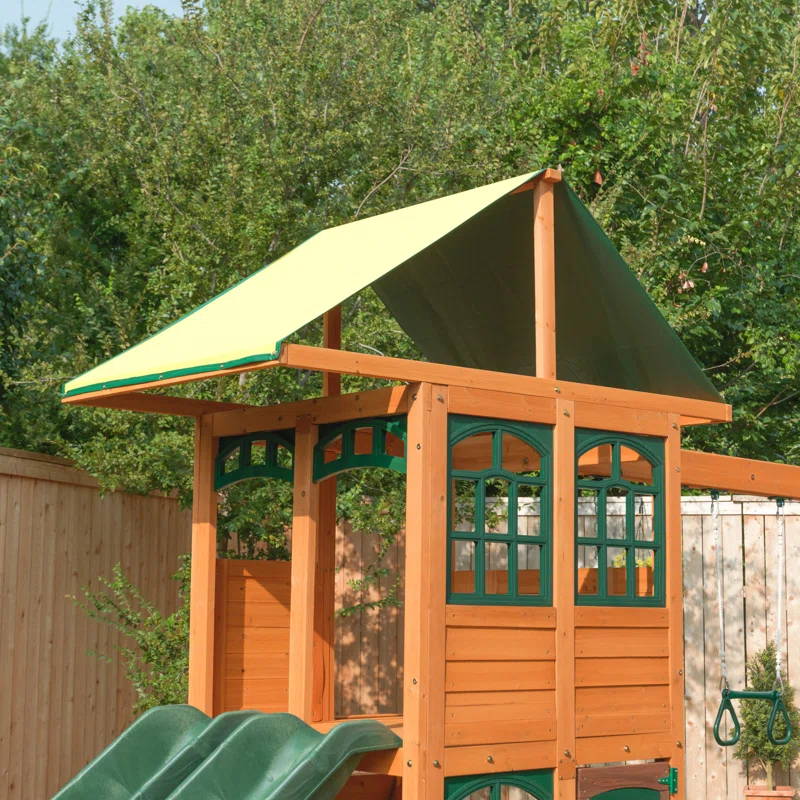 KidKraft Treasure Cove Wooden Swing Set with Slides and Rock Wall