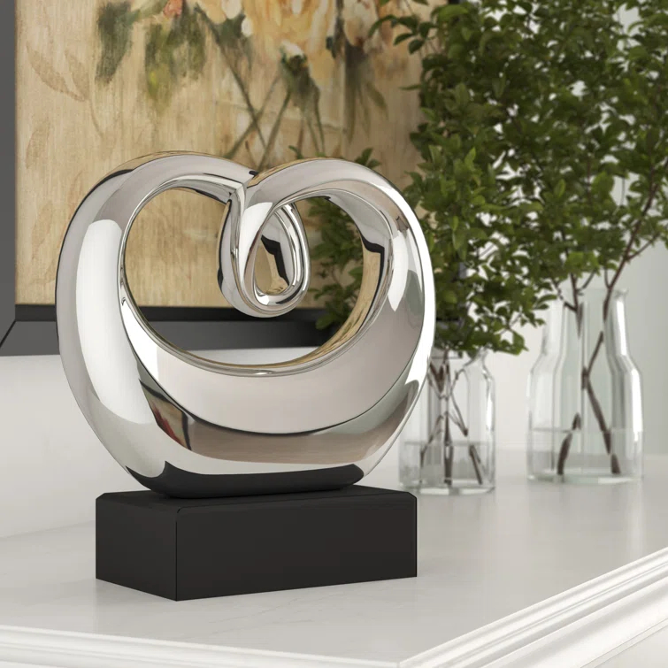 Wrought Studio™ Allye Ceramic Swirl Abstract Decorative Silver Sculpture with Black Base