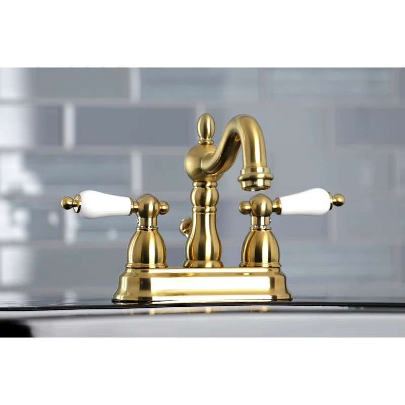 Kingston Brass Heritage Two-Handle 3-Hole Deck Mount 4" Centerset Bathroom Faucet with Plastic Pop-Up