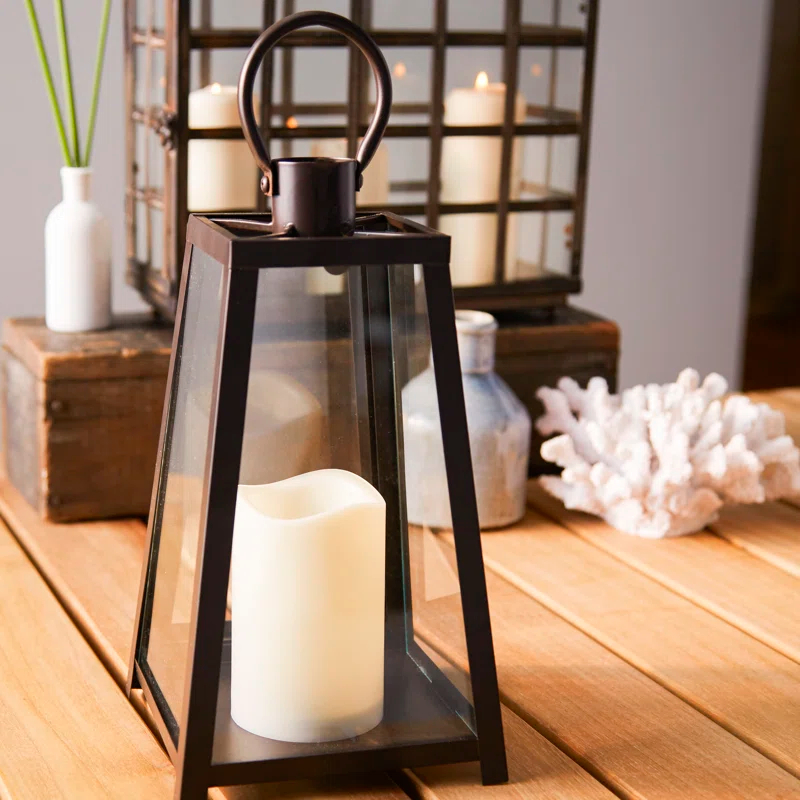The Holiday Aisle® Black Tapered Metal Lantern with Battery Operated Candle