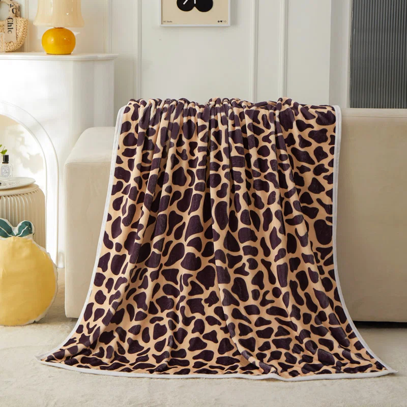 Kindred Home Lightweight Flannel Fleece Leopard Print Throw Blanket for Couch, Bed, Holiday Decor (60x80 Inches)