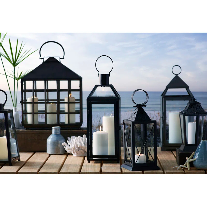 The Holiday Aisle® Black Tapered Metal Lantern with Battery Operated Candle