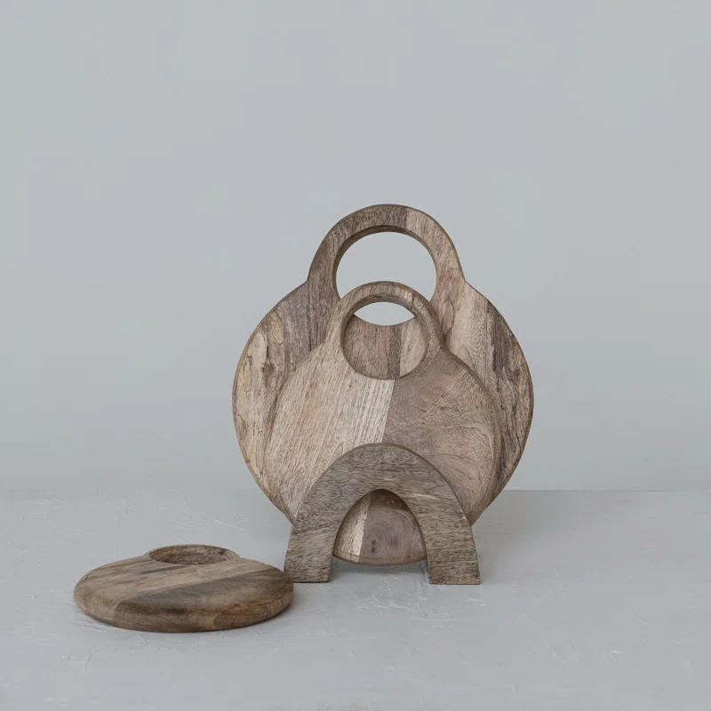 Creative Co-Op 3-Piece Round Mango Wood Cutting Boards In Various Sizes With Stand