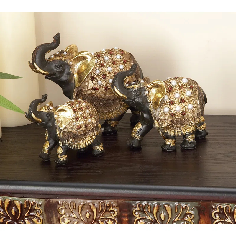 World Menagerie Alfhild Polystone Handmade Decorated Elephant Gold Sculpture with Ornate Dresswear and Pearl Accents Set