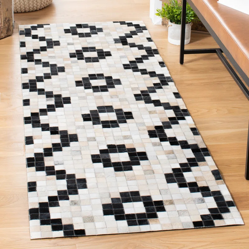 Union Rustic Sebeka Hand Woven Leather/Felted Cloth Chevron Rug in Ivory/Black