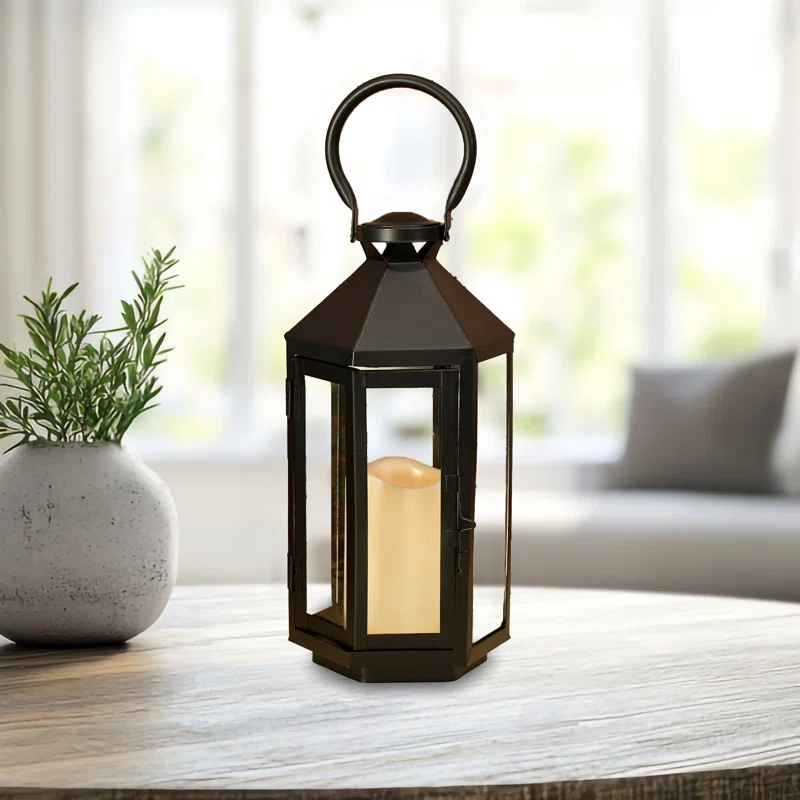 The Holiday Aisle® Black Hexagon Metal Lantern with Battery-Operated Candle