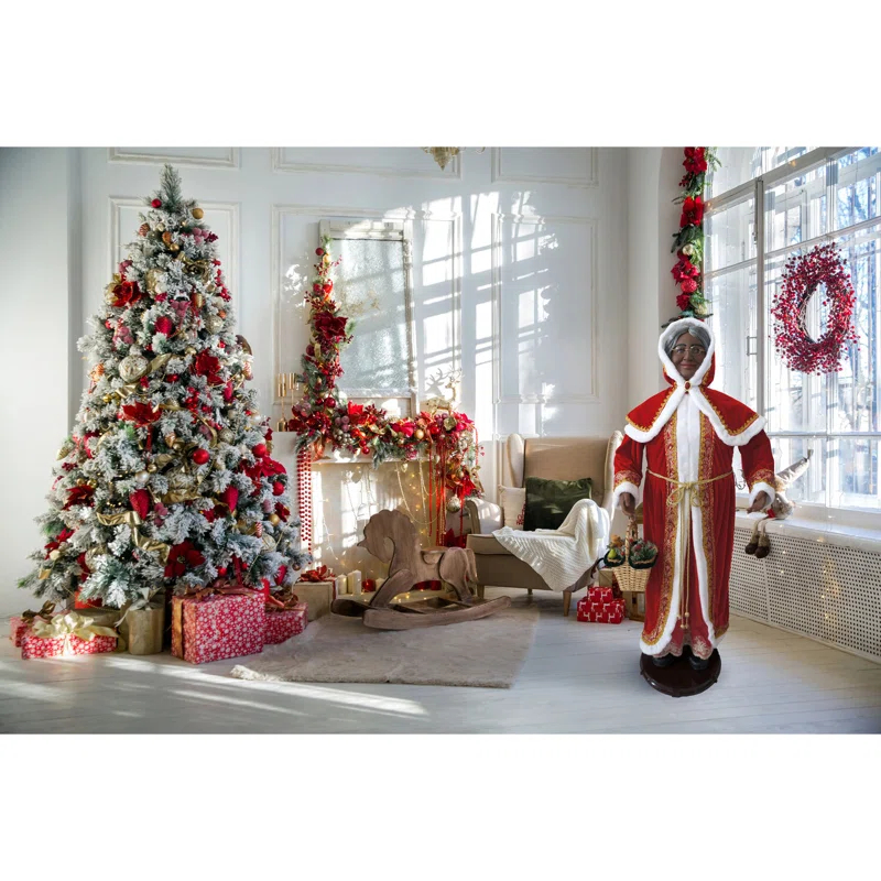African American Dancing Mrs. Claus with Hooded Cloak and Basket Figurine