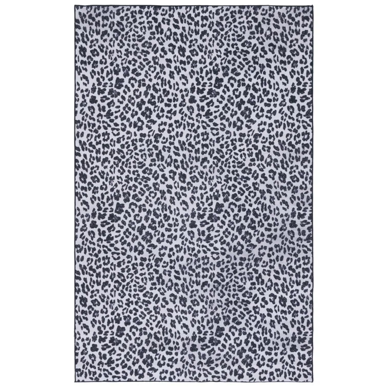 Everly Quinn Faux Hide Performance Machine Washable Animal Print Rug