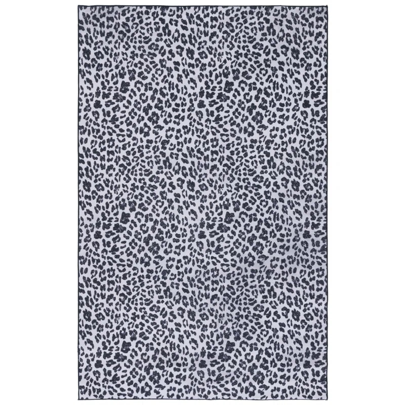 Everly Quinn Faux Hide Performance Machine Washable Animal Print Rug