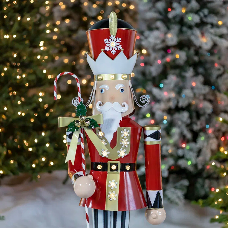 The Holiday Aisle® Large Iron Christmas Nutcracker "Harry" with Candy Cane