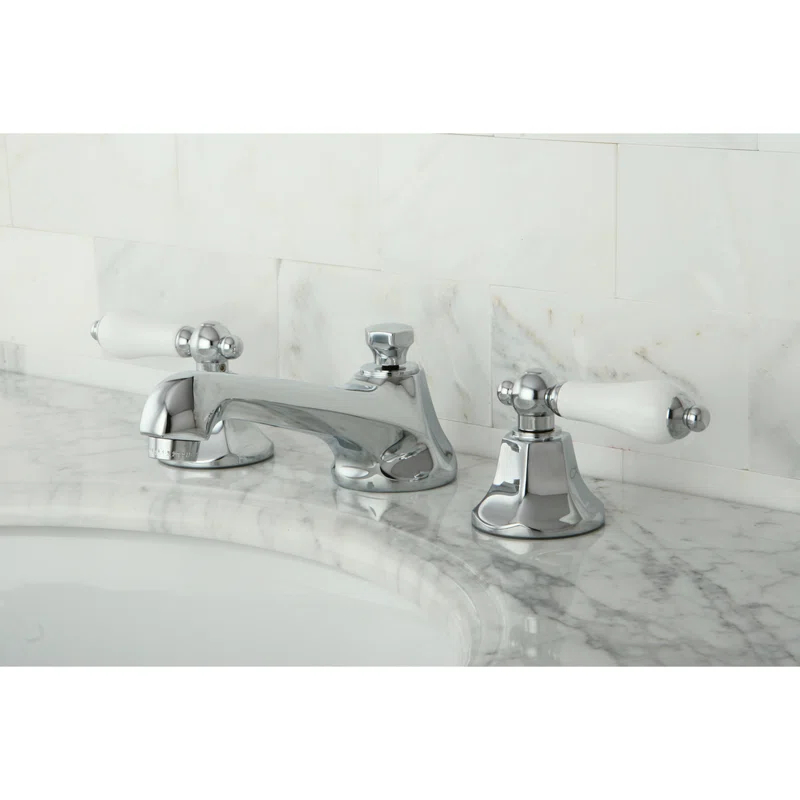 Kingston Brass Metropolitan Two-Handle 3-Hole Deck Mount Widespread Bathroom Faucet with Brass Pop-Up Drain
