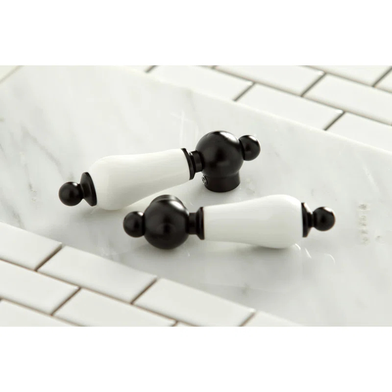 Kingston Brass Heritage Two-Handle 3-Hole Deck Mount 4" Centerset Bathroom Faucet with Plastic Pop-Up