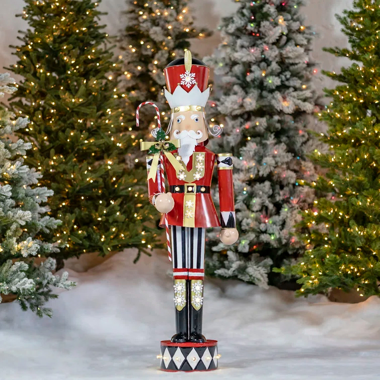 The Holiday Aisle® Large Iron Christmas Nutcracker "Harry" with Candy Cane