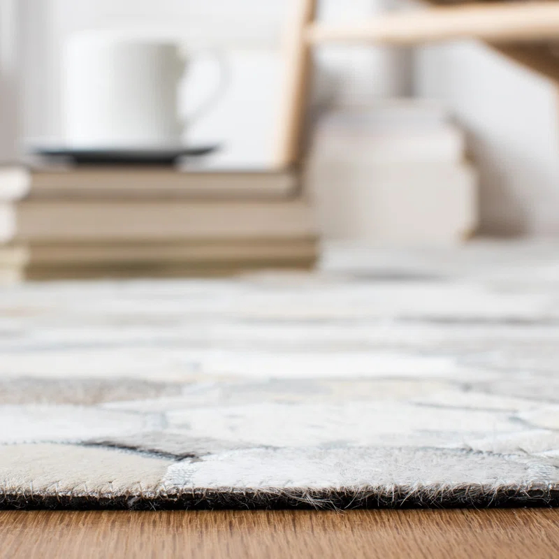 Millwood Pines Elyas Flat Weave Hair On Leather Geometric Rug