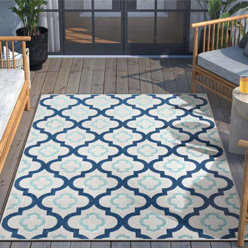 Ebern Designs Dickenson Illuminate Geometric Blue Indoor/Outdoor Hi-Lo Area Rug