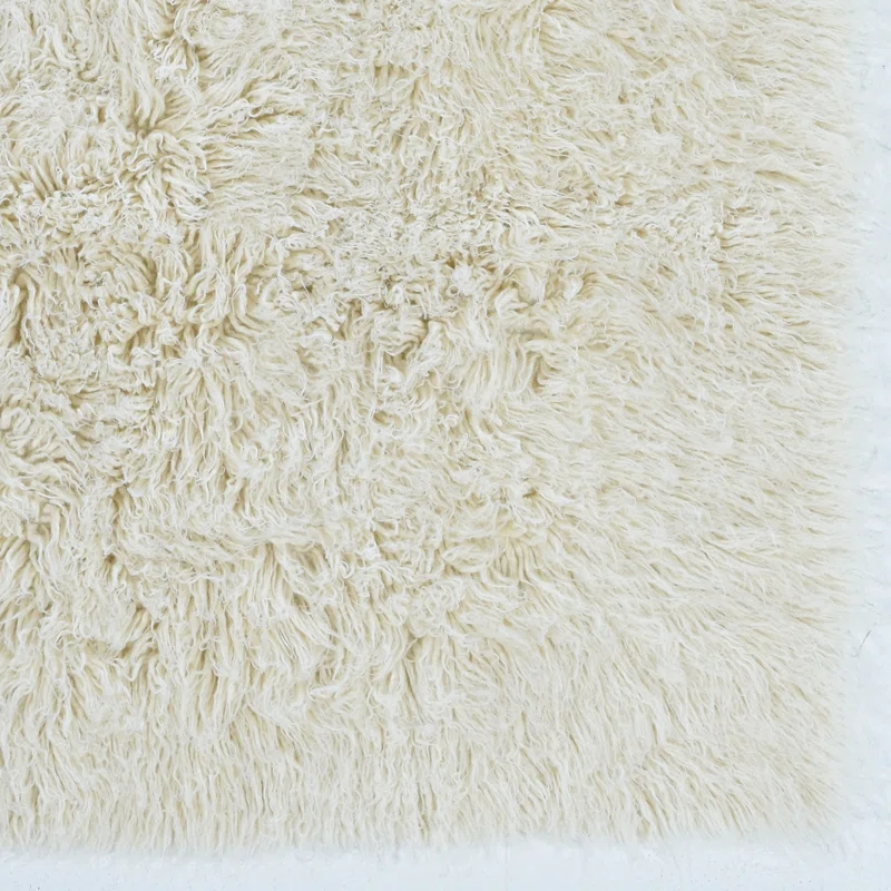 Ebern Designs Aaiden Flokati Wool Shag Hand Loomed Ivory Rug
