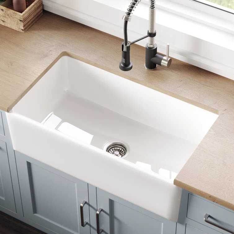 KRAUS Turino™ Reversible 33-inch L Fireclay Farmhouse Flat Apron Front Single Bowl Kitchen Sink with Bottom Grid