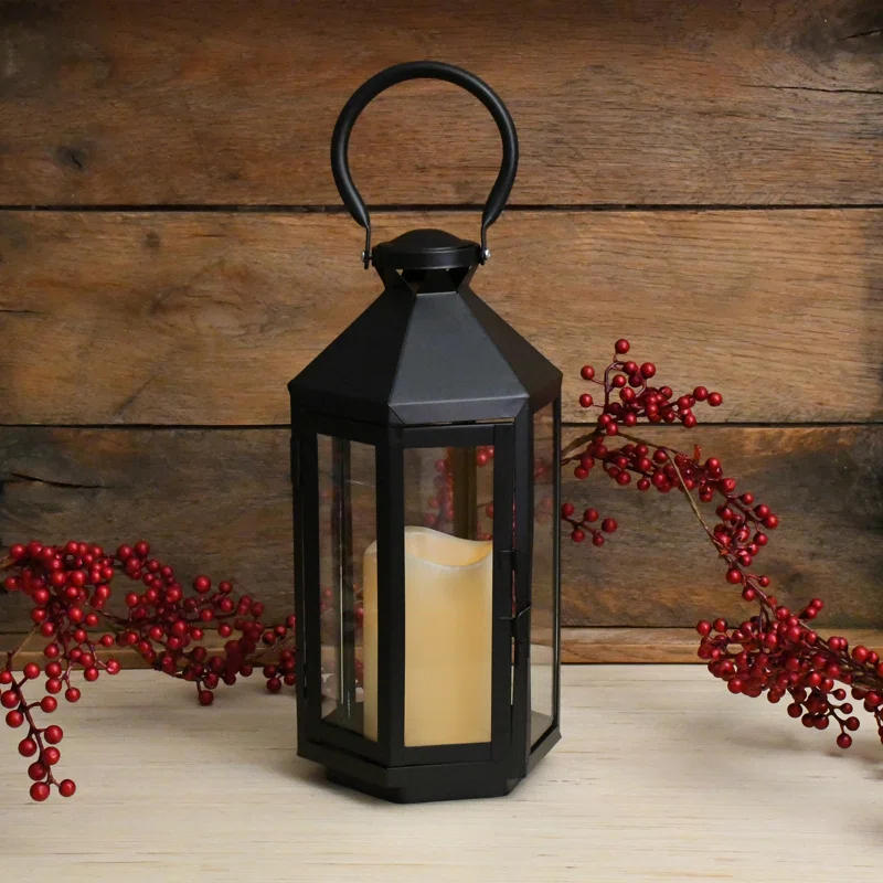 The Holiday Aisle® Black Hexagon Metal Lantern with Battery-Operated Candle