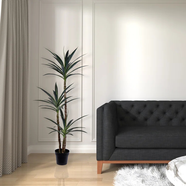 Artificial Green Yucca Tree in Black Planters Pot.