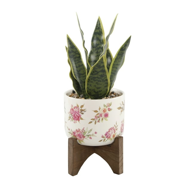 12" Artificial Snake Plant in Floral Print Ceramic Planter on Wood Stand
