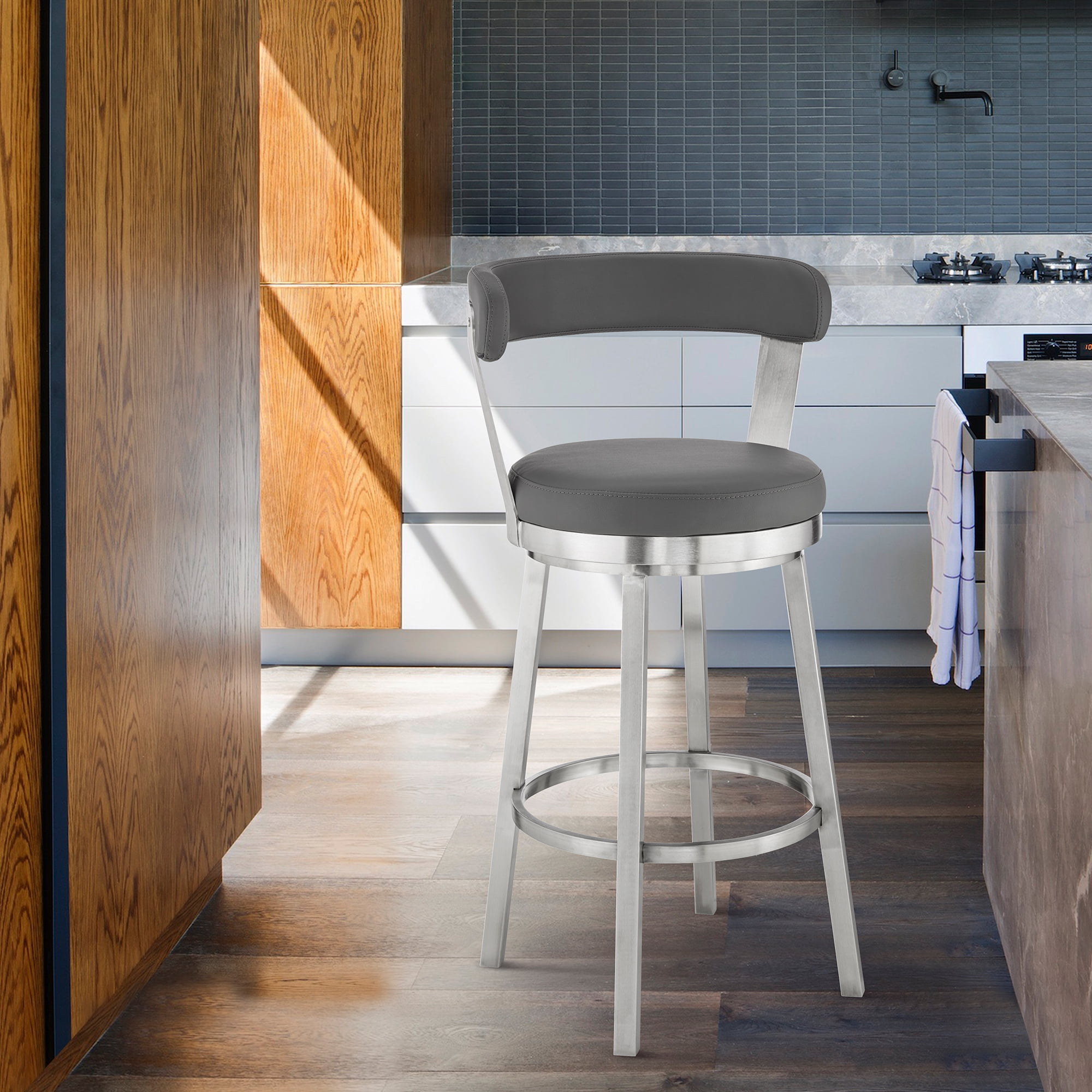 Armen Living Indoor Kobe 30" Bar Height Swivel Bar Stool in Brushed Stainless Steel Finish and Black Faux Leather