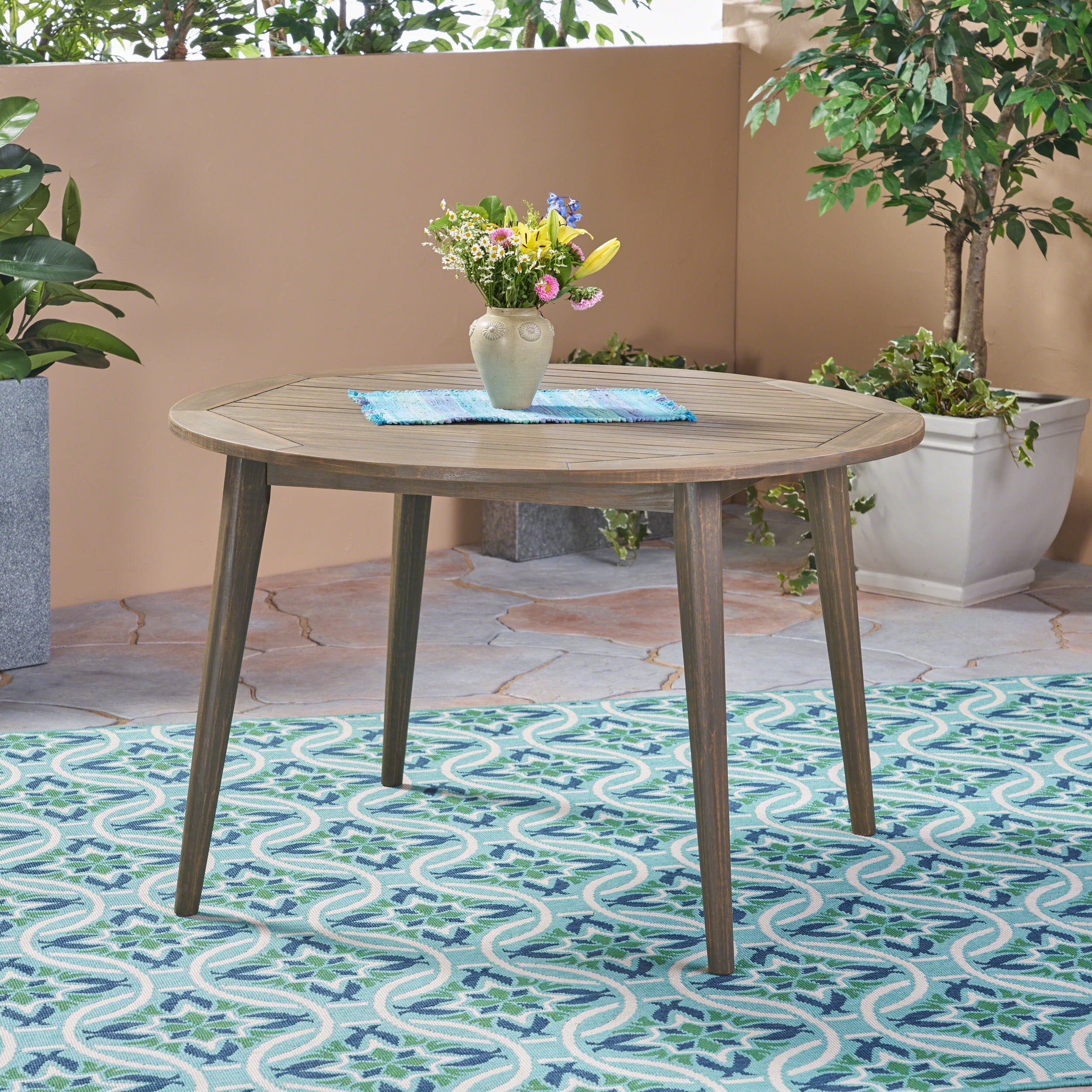 Noble House Stamford 47.25" Round Wooden Patio Dining Table in Gray