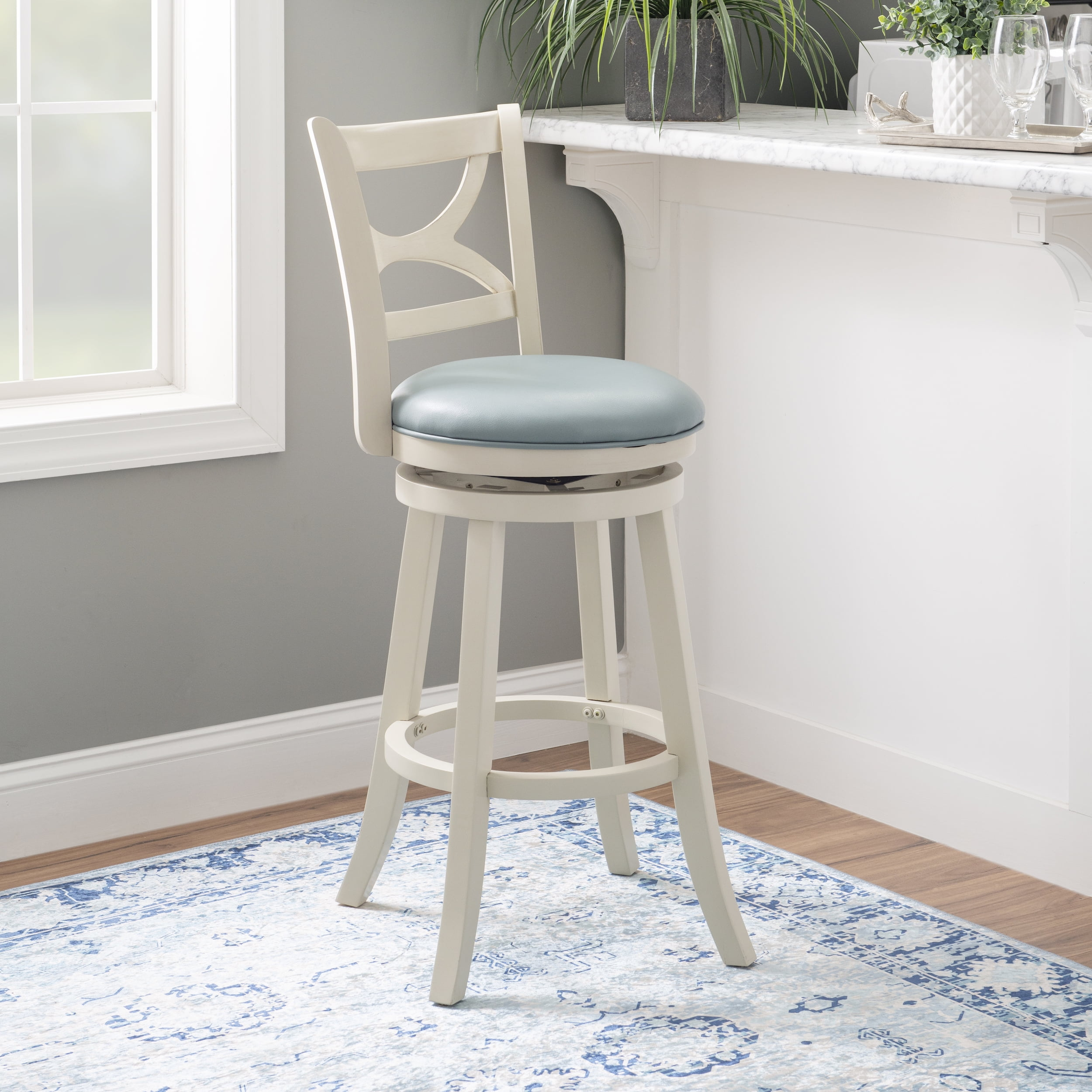 Linon Sawyer 30" High Swivel Bar Stool with Faux Leather Seat in Cream Wood