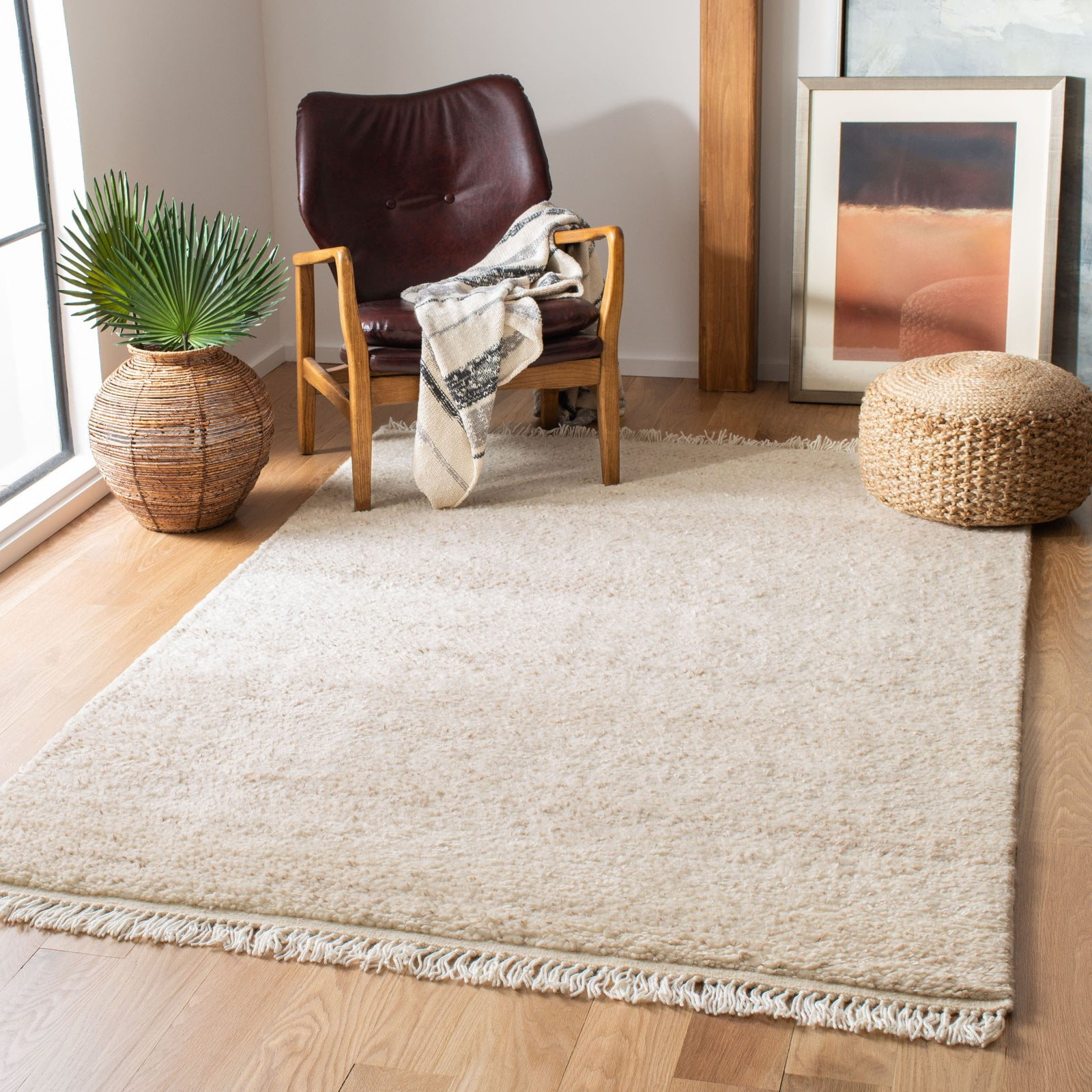 SAFAVIEH Casablanca Carbrey Solid Wool Shag Area Rug, Beige, 4' x 6'