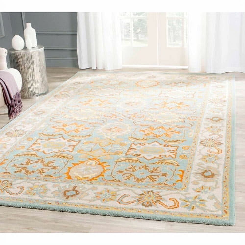 SAFAVIEH Heritage Giles Traditional Wool Area Rug, Light Blue/Ivory, 6' x 9'