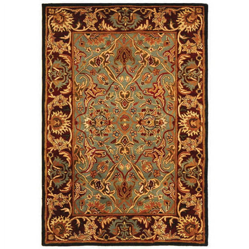SAFAVIEH Heritage Shanelle Oriental Wool Area Rug, Light Blue/Red, 4' x 6'
