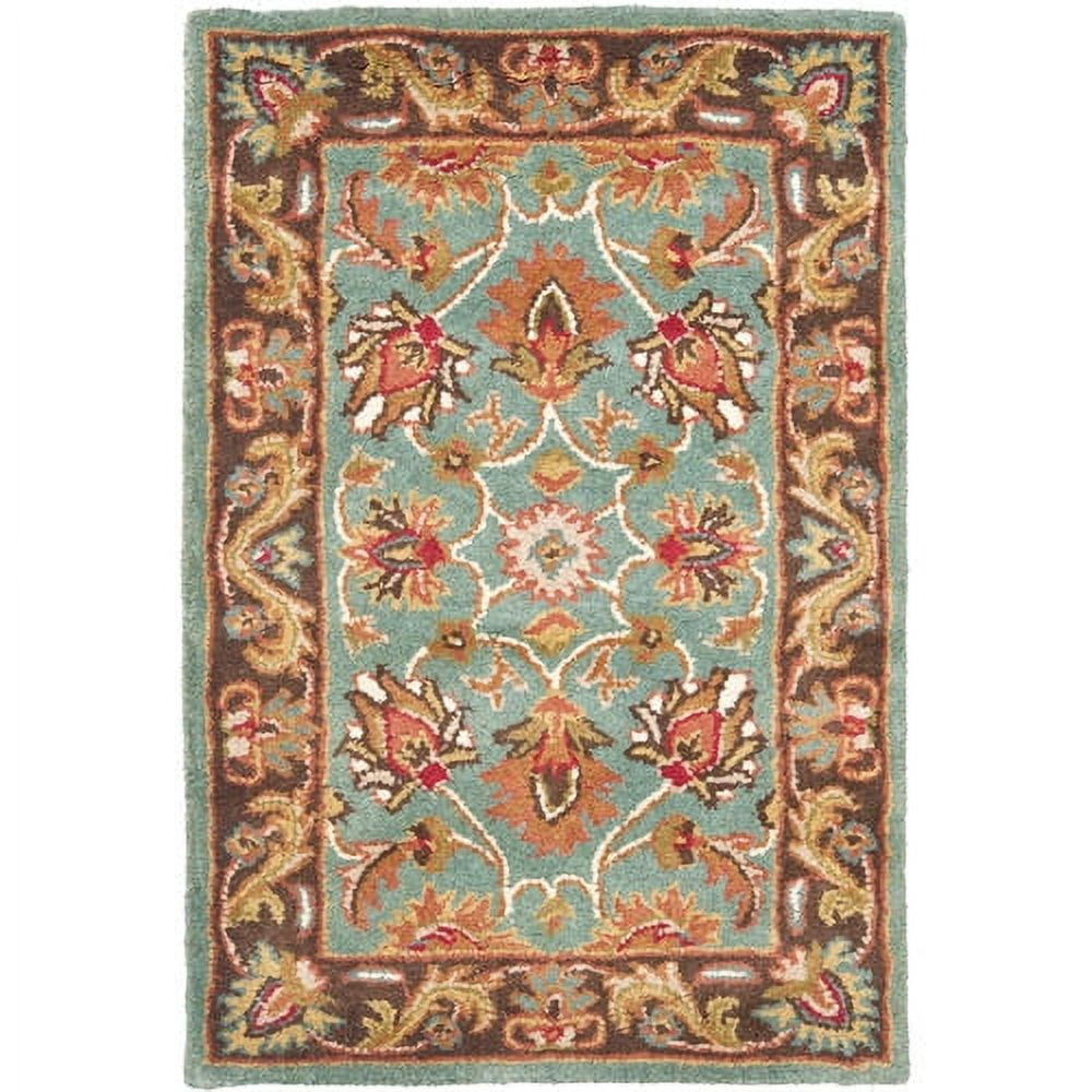 Heritage HG812 Hand Tufted Area Rug - Blue/Brown - 4'6"x6'6" Oval - Safavieh.