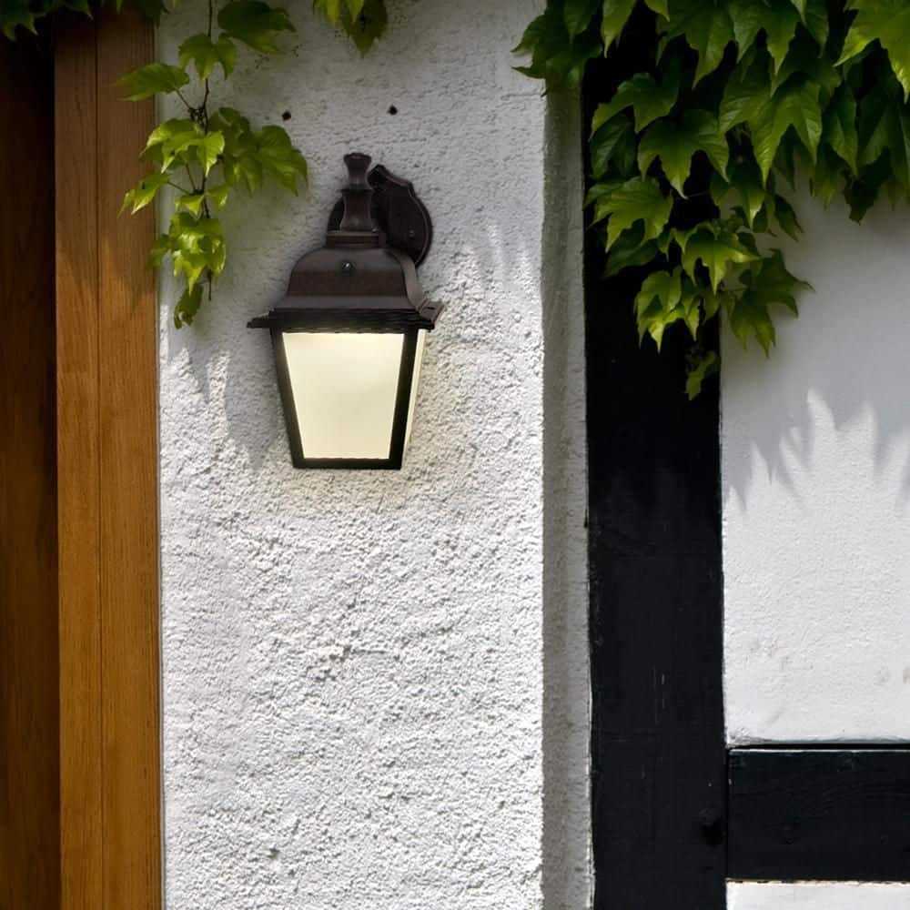 Maxxima LED Porch Lantern Outdoor Wall Light, Aged Bronze w/ Frosted Glass, Dusk to Dawn Sensor, 3000K