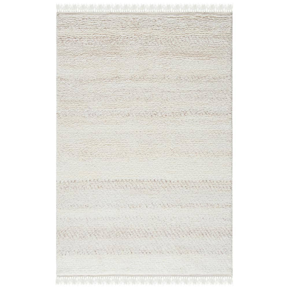 SAFAVIEH Casablanca Carbrey Solid Wool Shag Area Rug, Beige, 4' x 6'