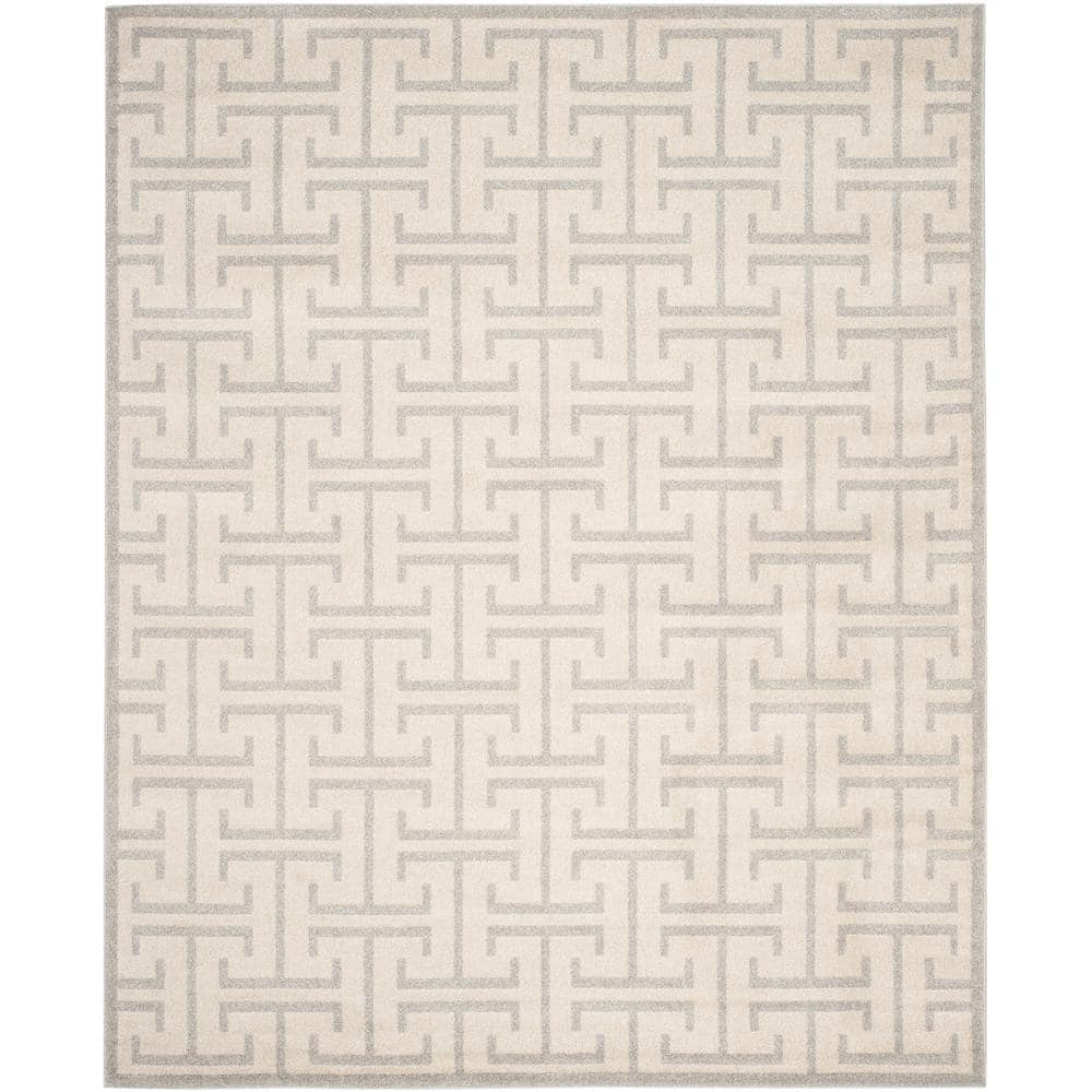 Ivory and Light Gray Rectangular 9' x 12' Synthetic Rug