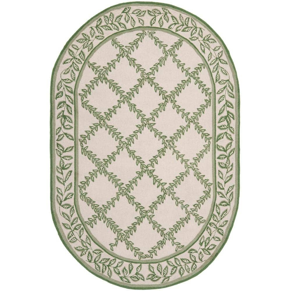 SAFAVIEH Chelsea Alecia Geometric Borders Wool Area Rug, Ivory/Light Green, 4'6"x6'6" Oval