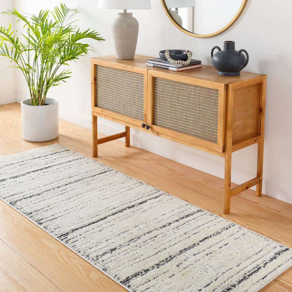 Ivory Striped Elegance 6'6" x 9' Synthetic Area Rug