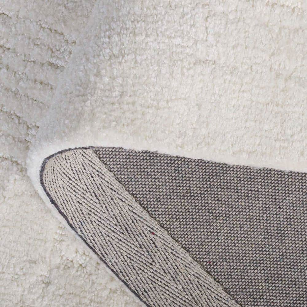 Audrey 4 ft. x 6 ft. Ivory Solid Abstract Area Rug
