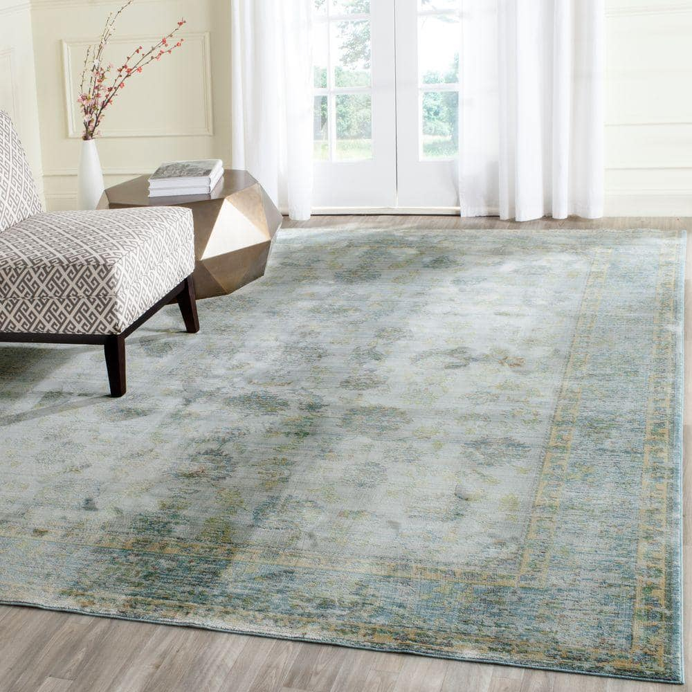 SAFAVIEH Valencia Cionadogh Floral Bordered Polyester Area Rug, Light Blue/Turquoise, 9' x 12'