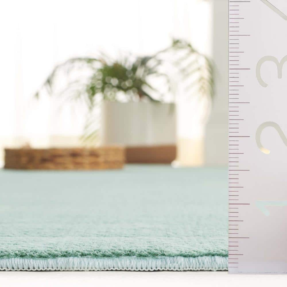 SAFAVIEH Faux Rabbit Fur Daven Solid Polyester Machine Washable Area Rug, Sage, 4' x 6'