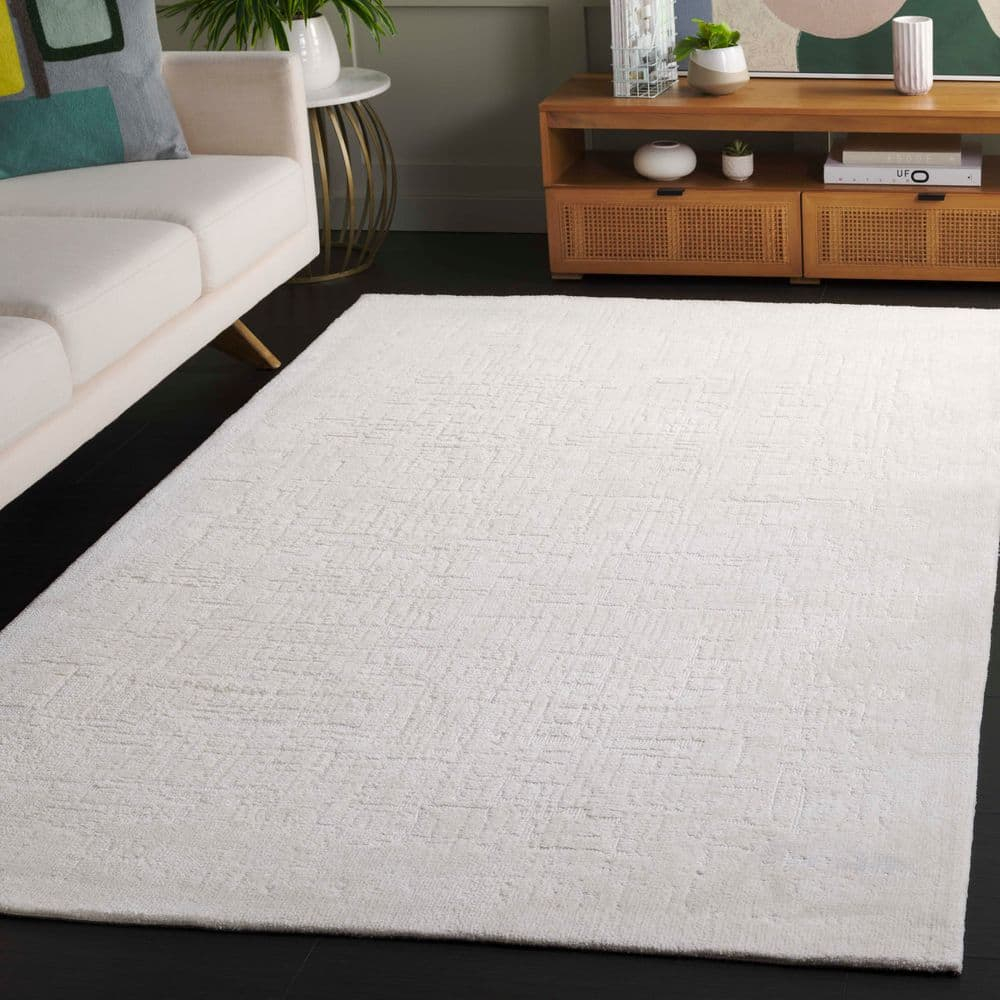 Audrey 4 ft. x 6 ft. Ivory Solid Abstract Area Rug