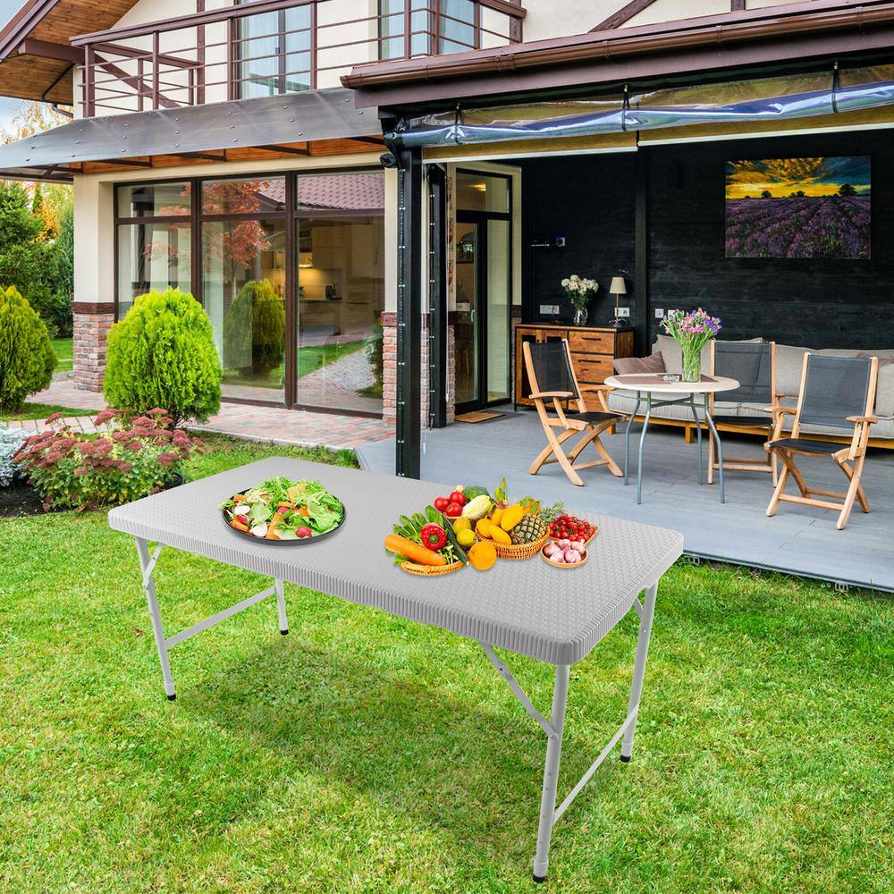 4 ft. White Composite Folding Outdoor Dining Table