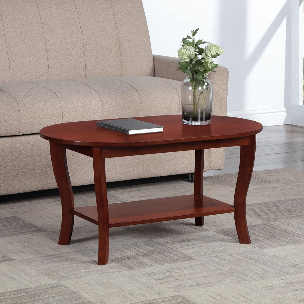 American Heritage Oval Coffee Table with Shelf in Mahogany Wood Finish