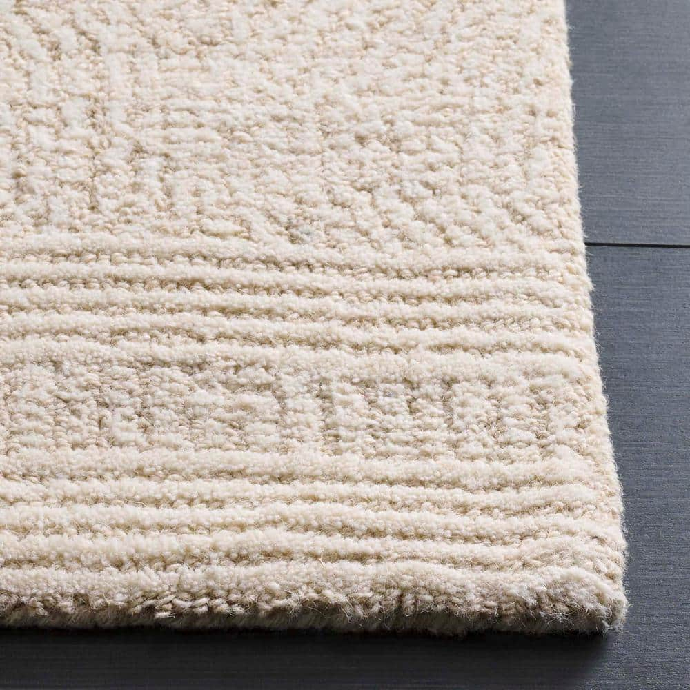 Ivory and Beige 6' x 9' Handmade Wool Abstract Area Rug
