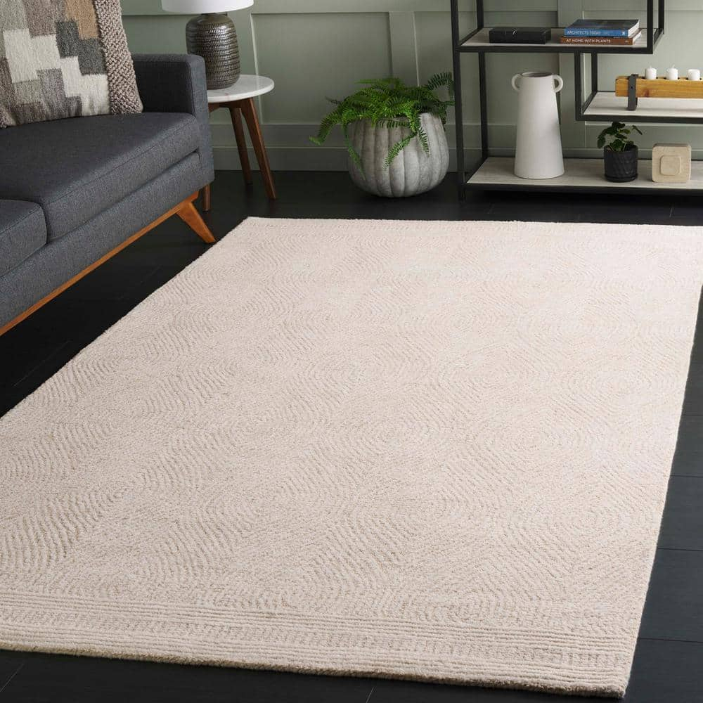 Ivory and Beige 6' x 9' Handmade Wool Abstract Area Rug