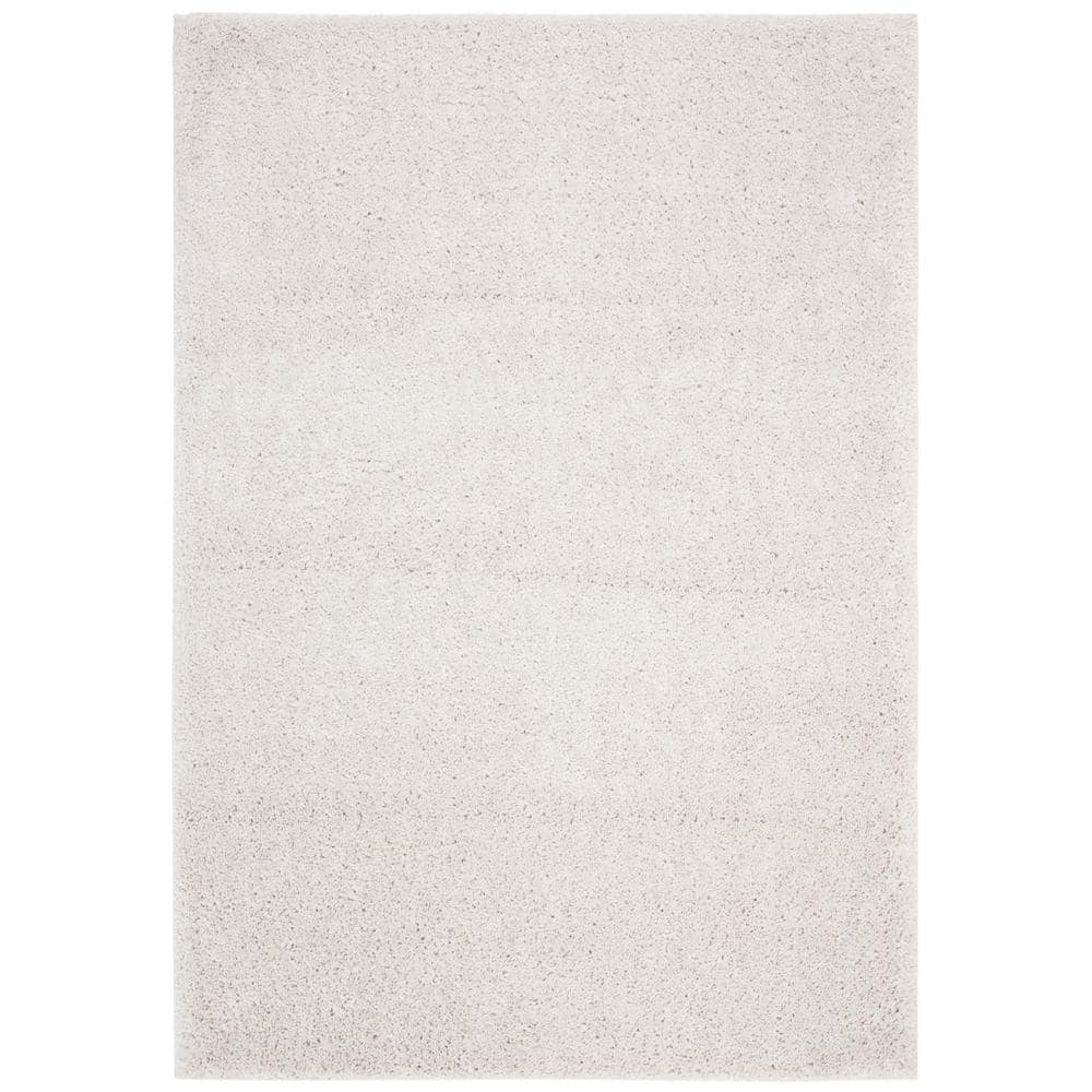 SAFAVIEH August Carlene Solid Plush Shag Area Rug, Beige, 9' x 12'