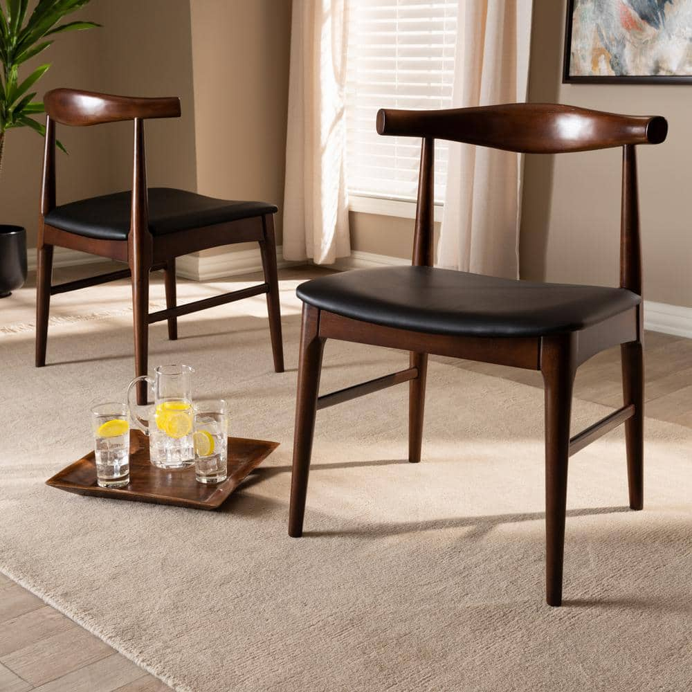 Baxton Studio Eira Mid-Century Modern Black Faux Leather Upholstered Walnut Finished Wood Dining Chair Set of 2