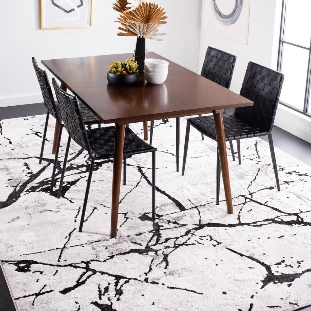 Handmade Round Gray and Black Abstract Synthetic Rug