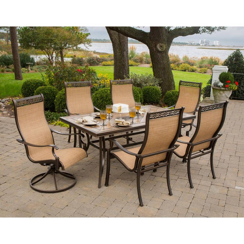 Hanover Monaco 7-Piece Outdoor Patio Dining Set with 4 PVC Sling Dining Chairs, 2 Swivel Rockers, and 40" x 68" Porcelain Tile Rectangular Dining Table | MONACO7PCSW