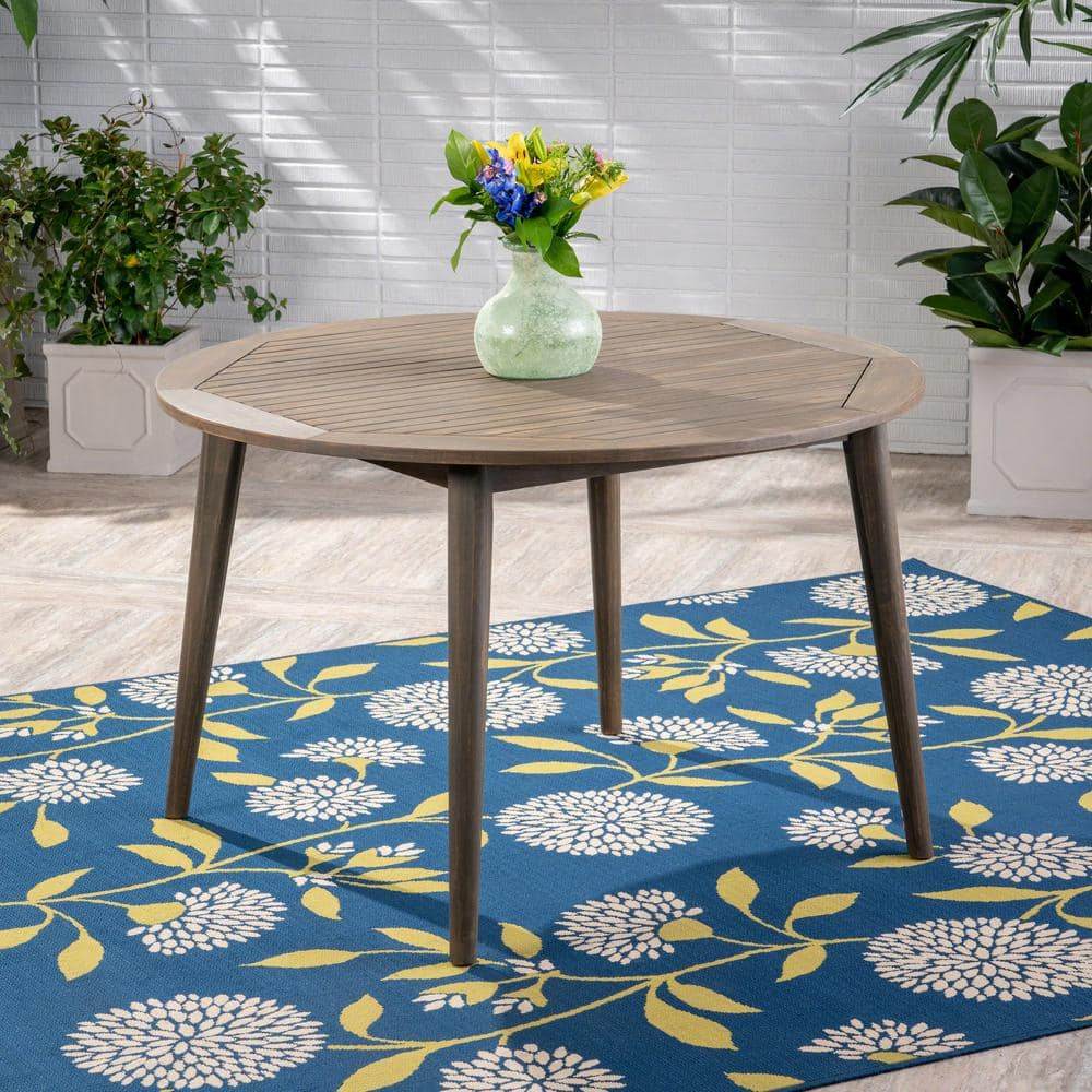 Noble House Stamford 47.25" Round Wooden Patio Dining Table in Gray